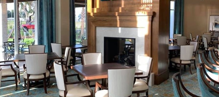 Bright common area with tables and chairs