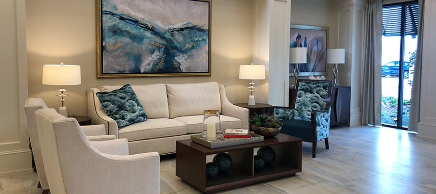 Comfortable common area with seating and artwork