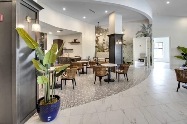 Bright common area with seating and decor