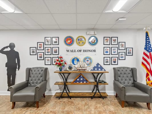 Common area featuring a Wall of Honor with decorations