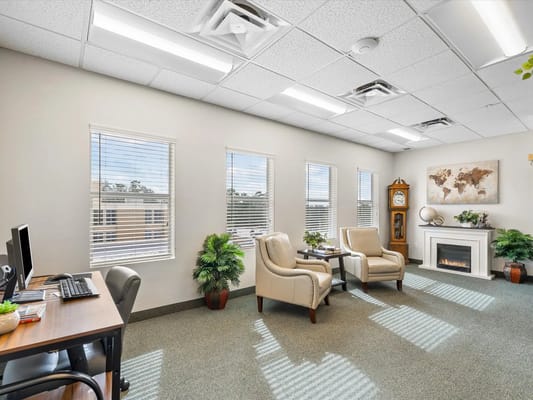 Bright common area with comfortable seating and decor