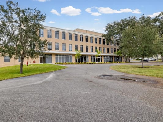 Exterior view of The Grande Senior Living facility