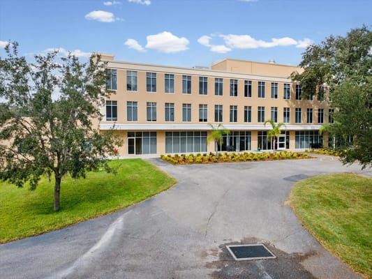 Exterior view of The Grande Senior Living facility