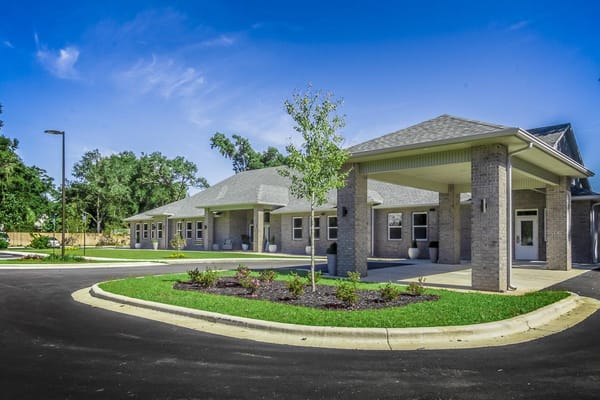 Exterior view of Shelton Manor Inc with landscaping
