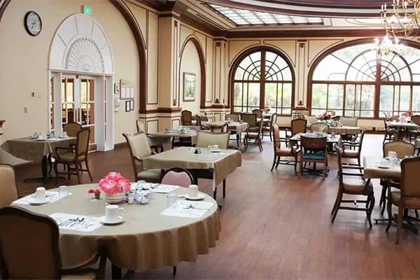 Dining room with tables set for meals