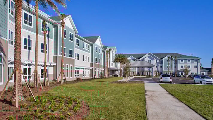 Exterior view of the Trinity Springs facility with landscaped area