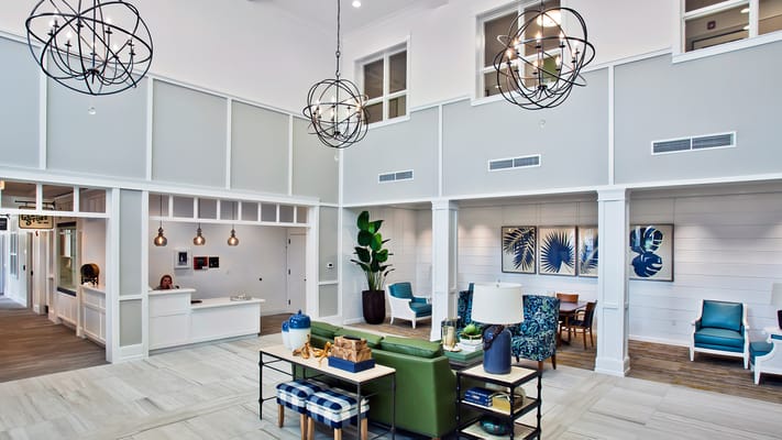 Bright common area with modern furniture and decor