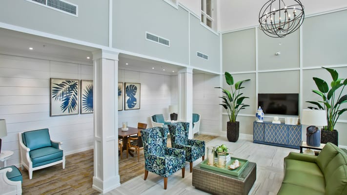 Bright, inviting common area with seating and decor