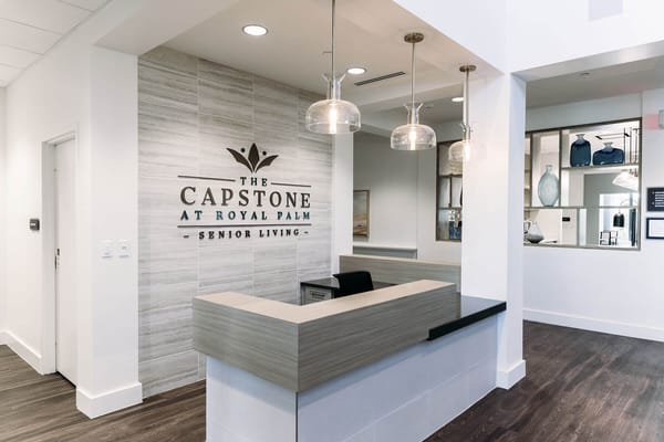 Bright reception area of the Capstone at Royal Palm