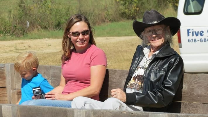 A woman and a senior resident enjoying time outdoors