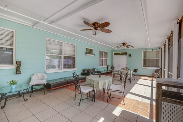 Well-lit common area with seating and decor