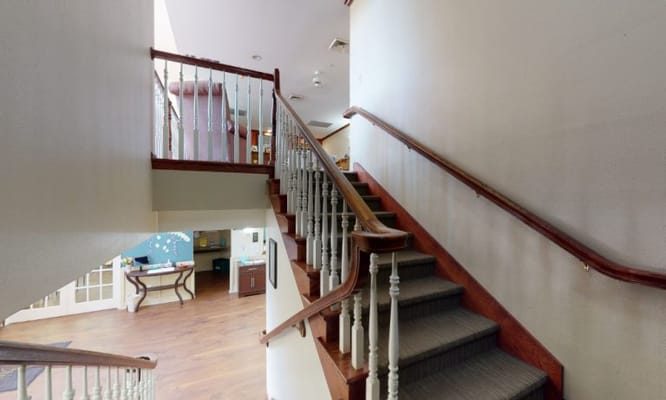 Interior view of a staircase and lobby area