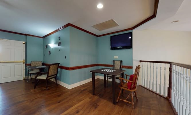 Cozy common area with seating and a television