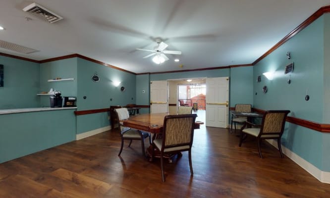 Bright common area with tables and chairs