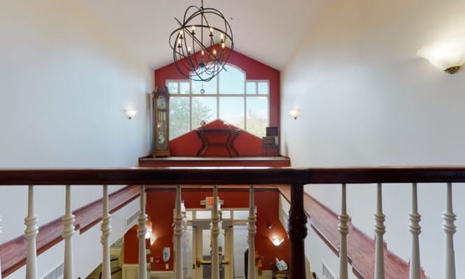 Interior view of a facility common area with a high ceiling