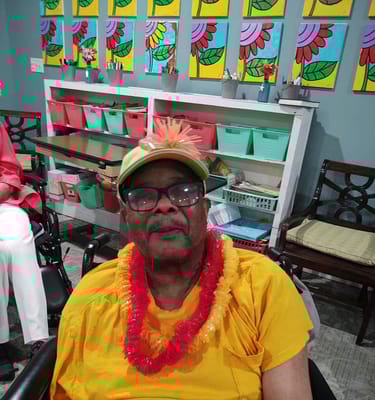 Resident participating in an indoor activity with decorations