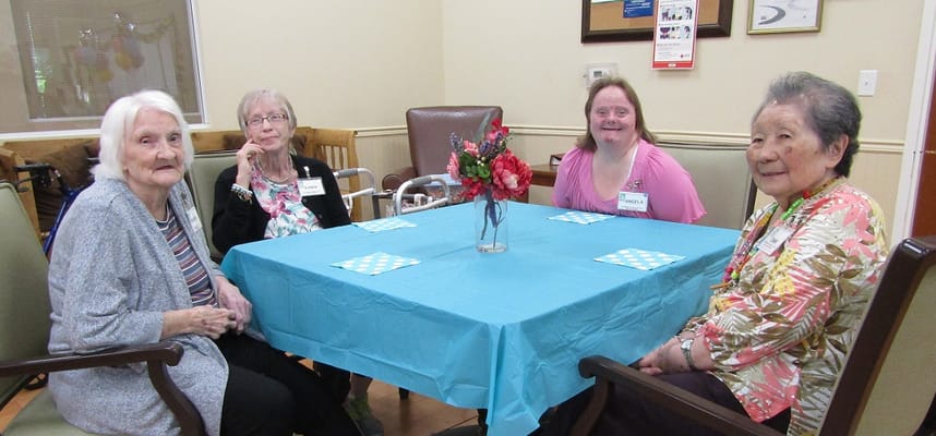 Residents enjoying a social moment in a common area
