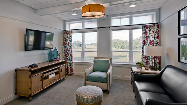 Bright common area with seating and natural light