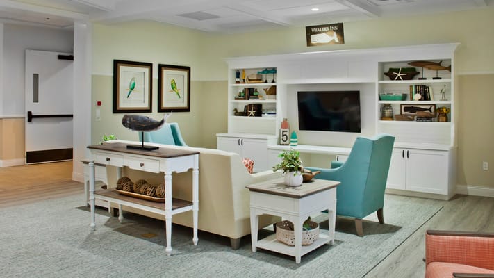 Bright common area with comfortable seating and decor