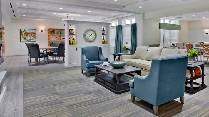 Bright common area with seating and decor