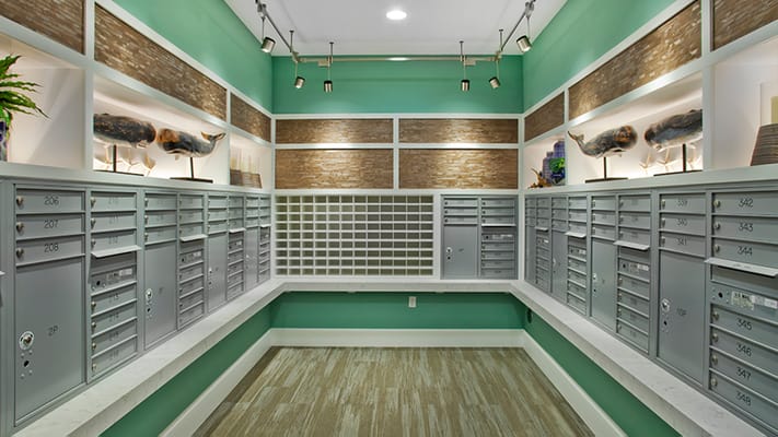 Interior view of a mail room with mailboxes