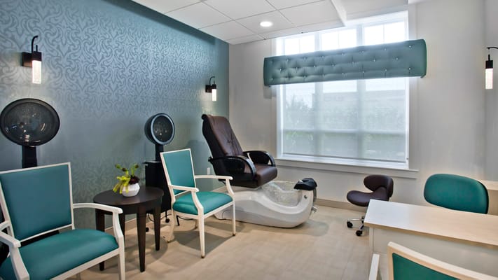 Interior view of a wellness room with spa chairs