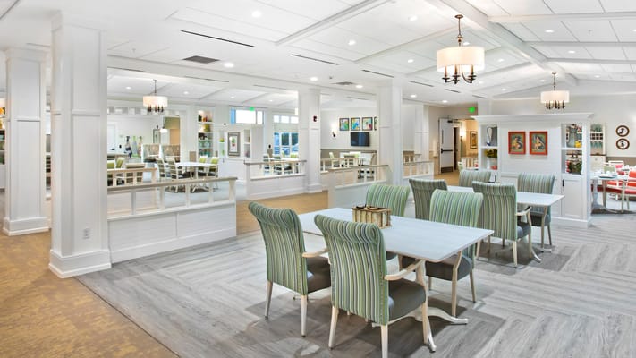 Bright common area with seating and artwork