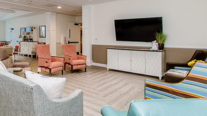 Common area with seating and television