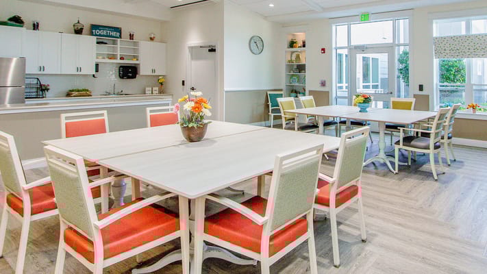 Interior common area with tables and chairs