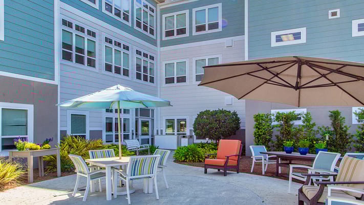 Patio area with seating and umbrellas