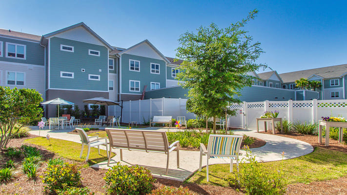 Beautifully landscaped outdoor area with seating