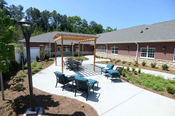 Outdoor space with seating and landscaped area