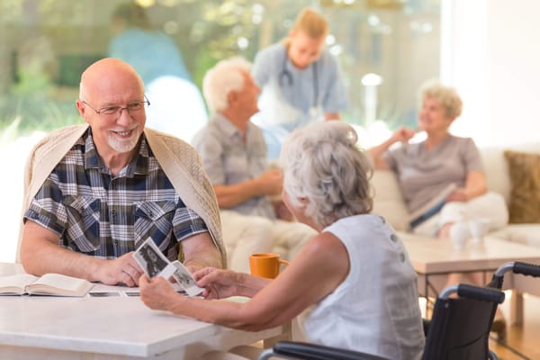 Residents engaging in conversation in a common area