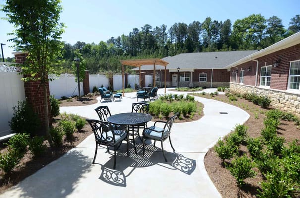 Beautiful landscaped outdoor space with seating area