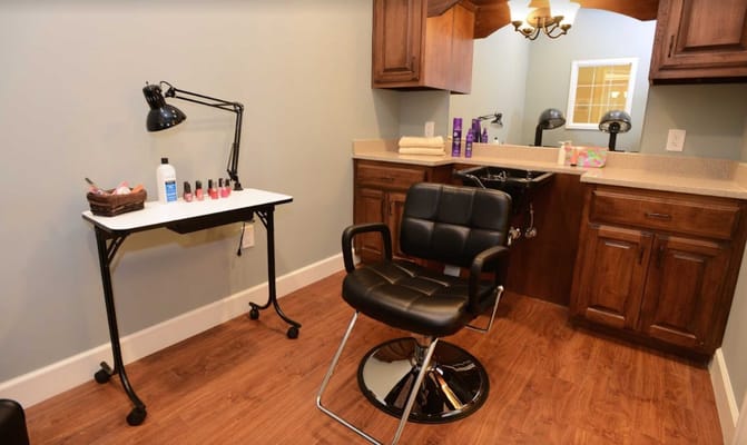 Beauty salon space with chair and nail polish