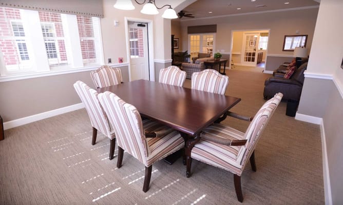 Common area with a dining table and chairs