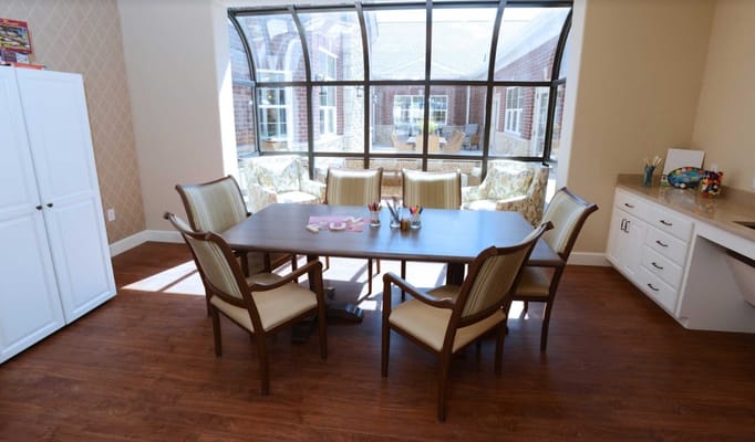 Interior common area with a dining table and chairs