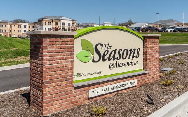 Facility sign with name and address at entrance