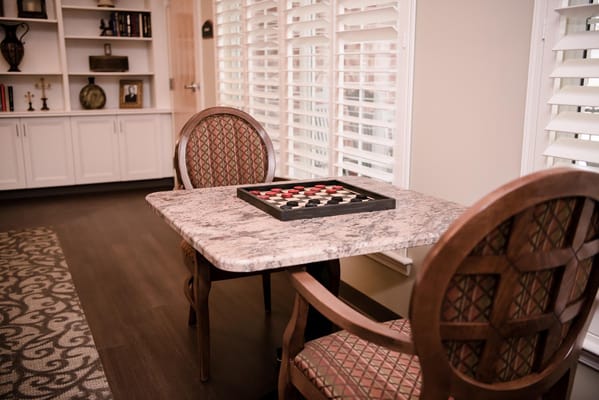 Table and chairs in a cozy common area