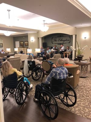 Residents enjoying a group activity in the common area