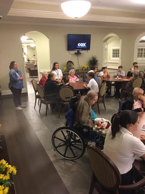 Residents participating in an activity in the common area