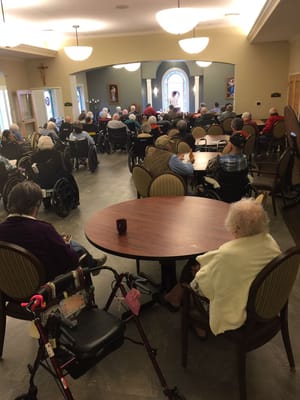 Residents gathered in a common area for an activity