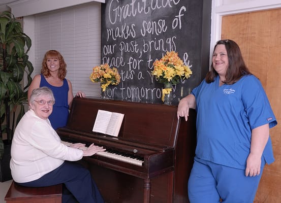 Residents and staff interacting in a common area