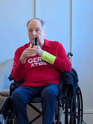 Resident speaking during an activity in common area