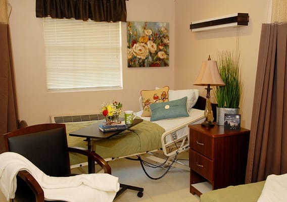 Cozy resident room with bed and decor