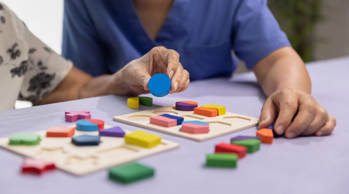 Residents engaging in a puzzle activity