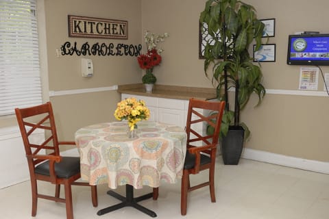 Cozy kitchen area with table and chairs