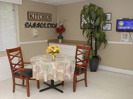 Common area with dining table and plants
