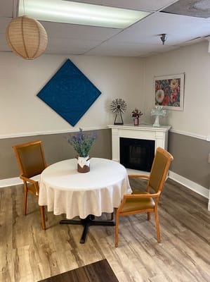 Cozy common area with a table and chairs