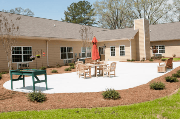 Outdoor patio area with seating and garden